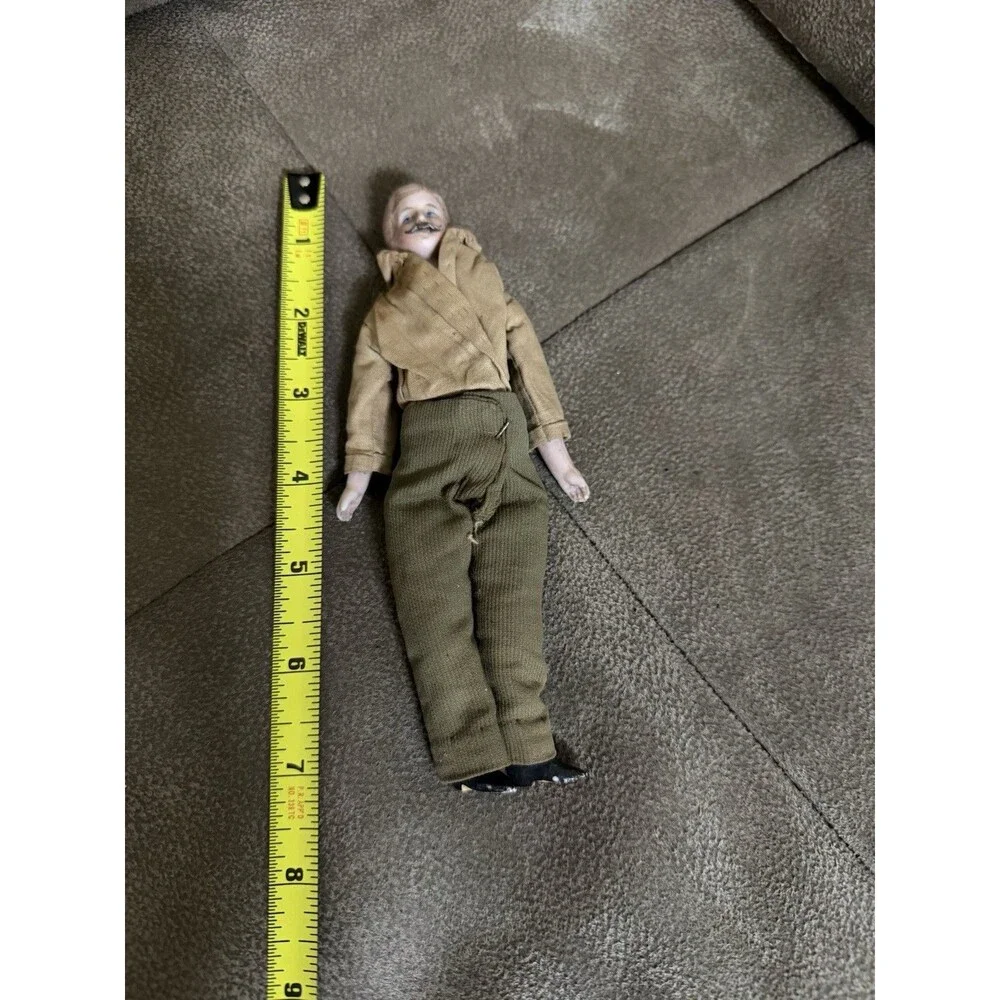 Antique German bisque gentleman doll, approximately 7 inches tall,